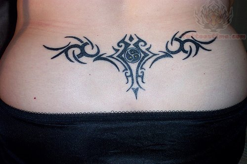 Awesome Tribal Design Tattoo On Lowerback